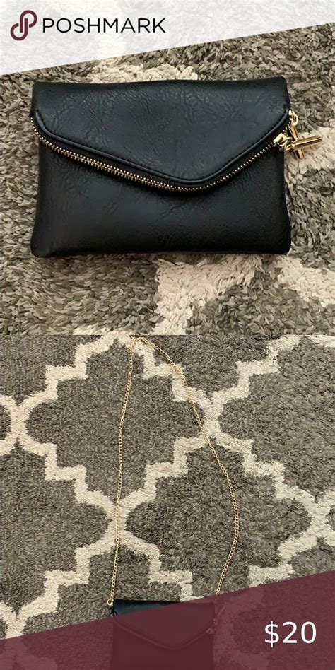 black clutch with gold chain.